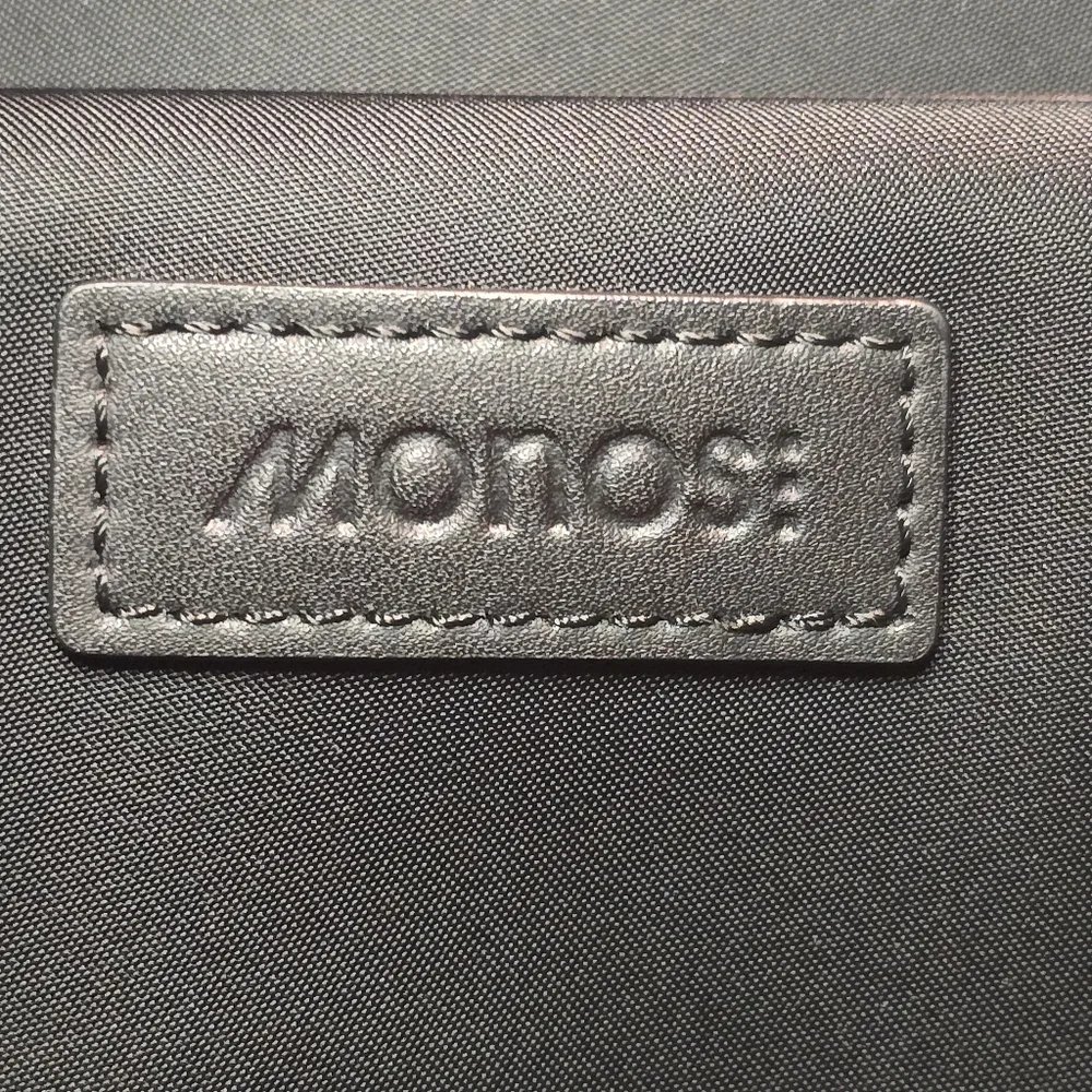 Monos Metro Duffel Black Vegan Leather Travel Bag Quicksnap Water Reaistant - Picture 2 of 16